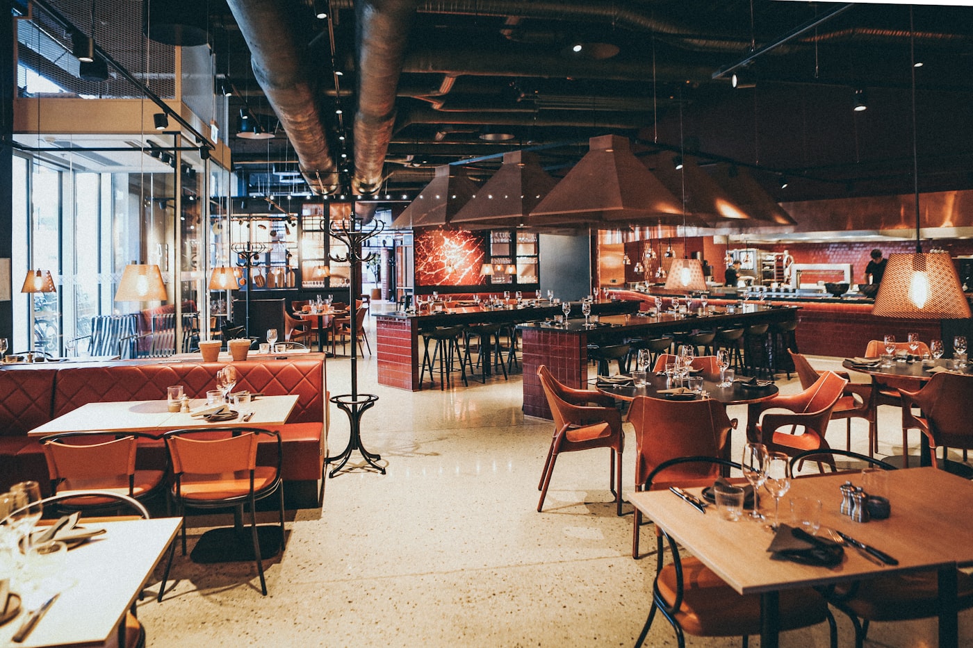 A private dining room with a long table set for an evening event